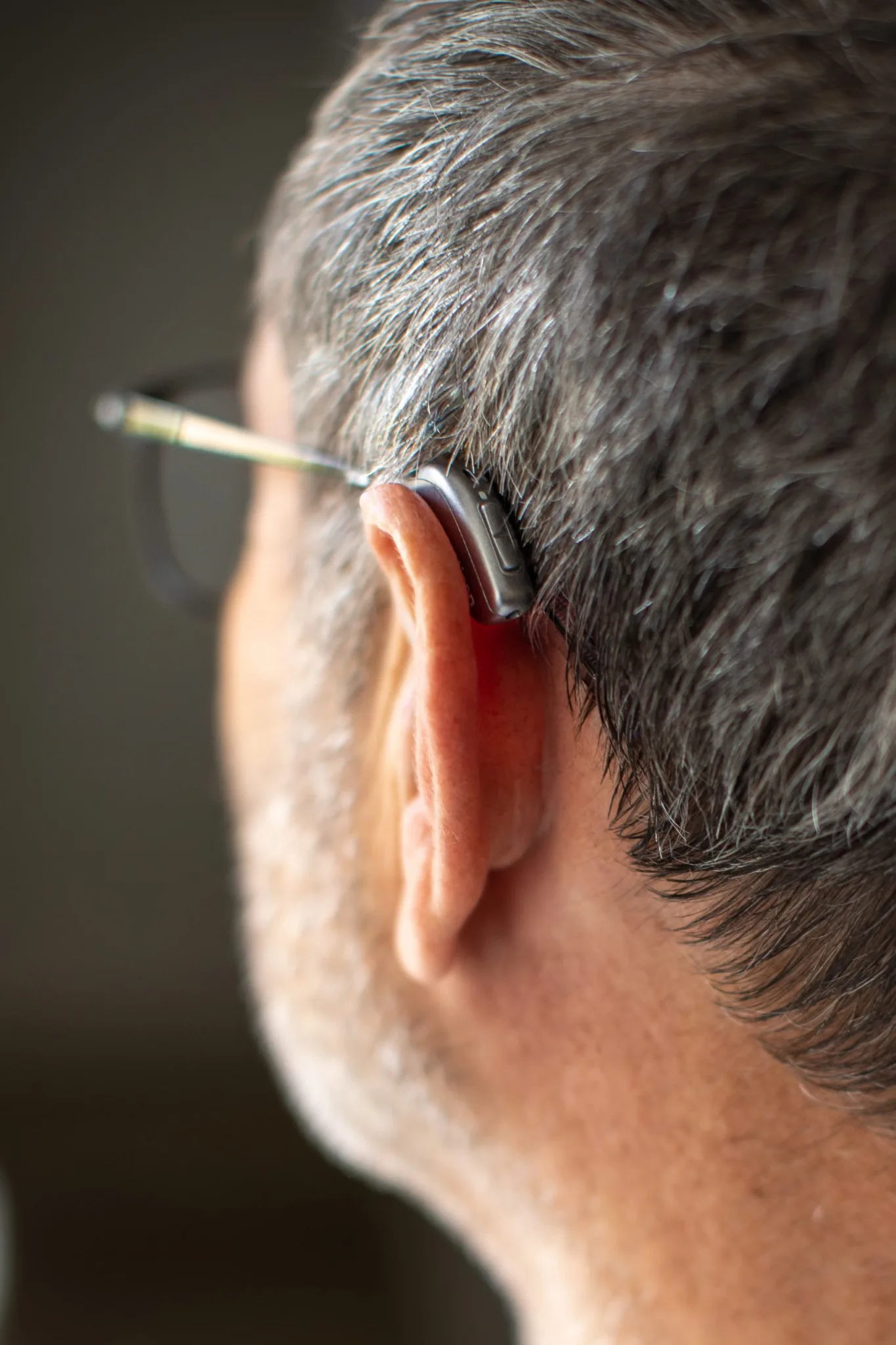 Person wearing a discreet hearing aid